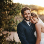 Shot of a happy young couple standing together on their wedding day